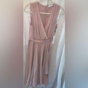 Calvin Klein, size 4, blush pink jumpsuit with front overlay skirt.